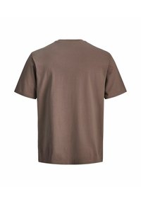 T-shirt marron uni à manches courtes vu de dos avec un col rond et sans logos ni motifs visibles.