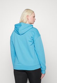 adidas Originals Mikina s kapucí - app sky rush