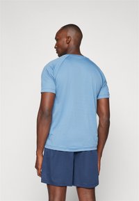 Lotto TRAINING  - Potiskana majica - coronet blue