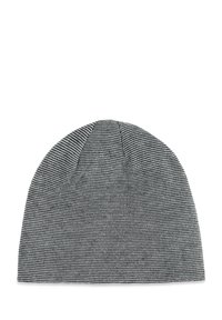 Bonnet en noir et blanc avec un motif texturé en zigzag. Tissu tricoté doux, couronne arrondie et forme ajustée qui épouse bien la tête.