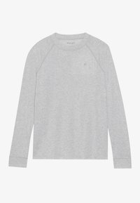 Ljusgrå långärmad T-shirt med rundad halsringning och diskret logotyp på bröstet samt raglanärmar, liggande platt på vit bakgrund.