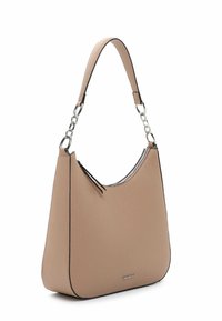 Beige faux leather handbag with a curved shape, silver chain strap, zip closure, and black edge detailing. Features two side tassels.
