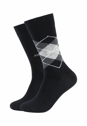 Chaussettes noires ornées d'un motif argyle gris et blanc avec des formes de diamant et de petits accents en points, fabriquées dans un tissu doux avec un bord côtelé.