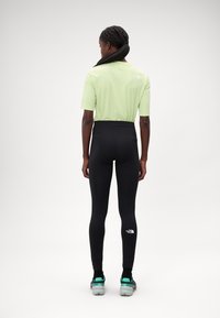 The North Face FLEX WARM TIGHT - Leggings - black