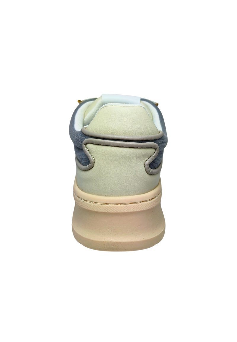 Sneaker with a grey suede upper and a cream-colored lower section. Features a textured rubber sole and padded collar for comfort.