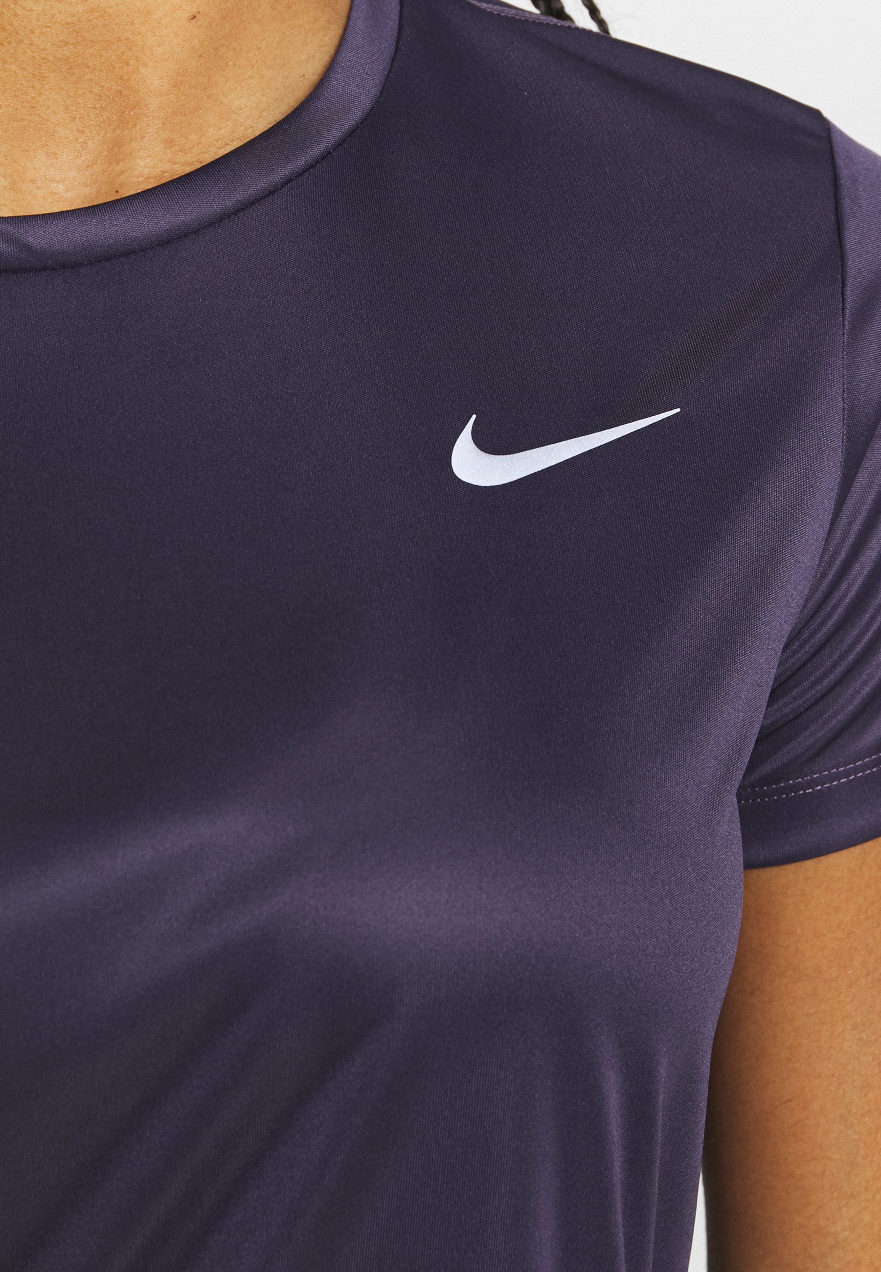purple nike miler