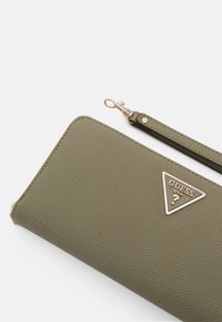 Guess LAUREL LARGE ZIP AROUND - Novčanik - sage