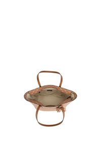 Sac fourre-tout beige avec un motif floral, des poignées en cuir, un dessus ouvert et un intérieur beige. Il présente un design simple et structuré.
