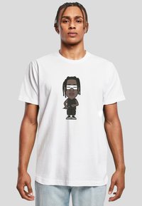 White cotton t-shirt featuring a cartoon graphic on the front, depicting a character with braids, sunglasses, and casual clothing.