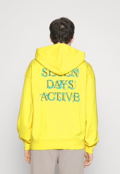 7 DAYS Active OVERSIZED GRAPHIC HOODIE UNISEX - Sportinis megztinis - lemon tonic