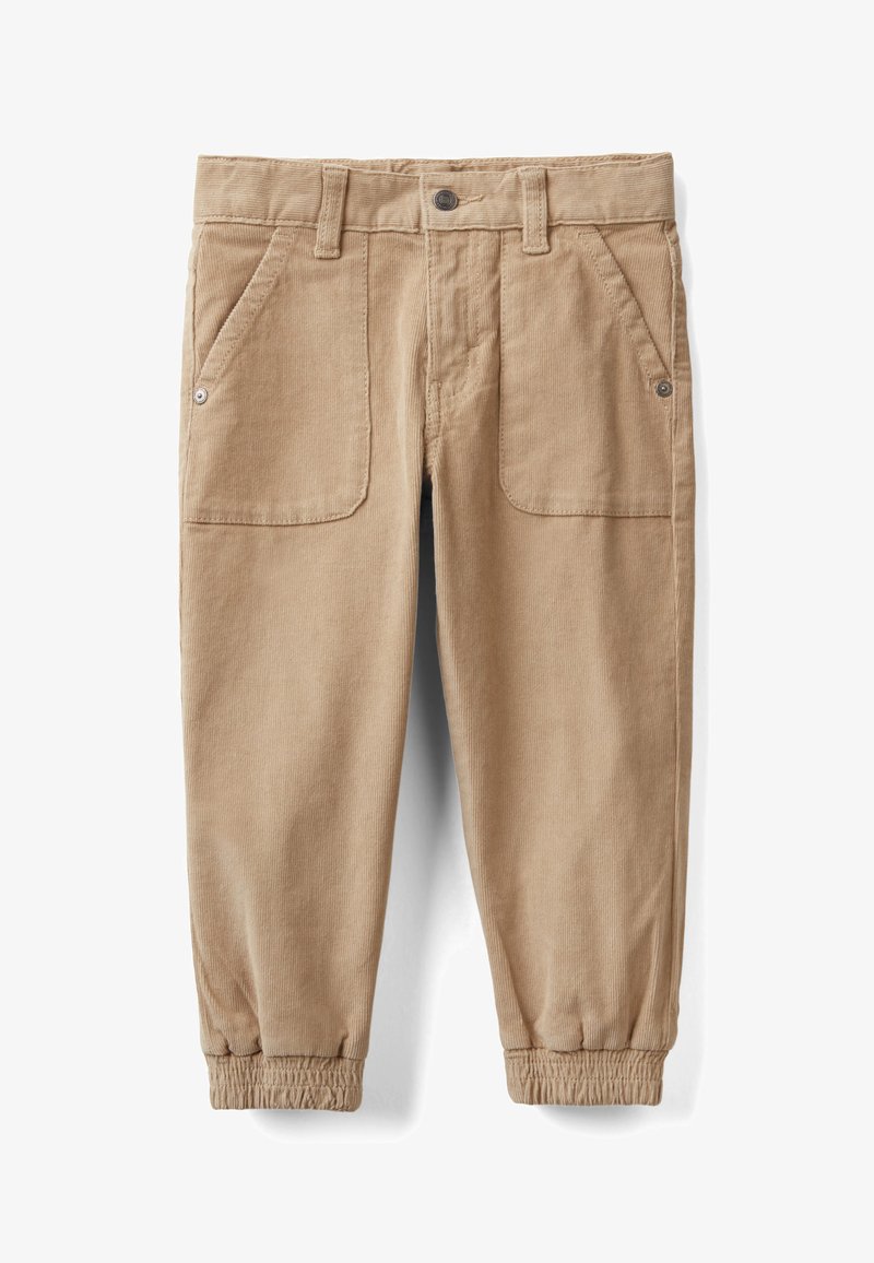 Beige korduroy kalhoty s elastickými manžetami, předními náprsními kapsami s detailními knoflíky, poutky na opasek a zapínáním na předním knoflíku.