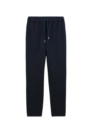 Pantalons de jogging navy en tissu doux. Présente une taille élastique avec cordon de serrage, deux poches avant et un design à jambes droites.