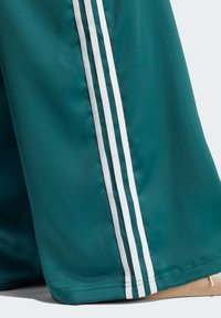 adidas Originals Donji dijelovi trenirke - collegiate green