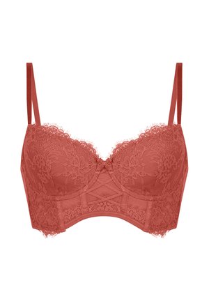 Soutien-gorge en dentelle couleur rose rouillé, avec armature, bretelles réglables, motif floral et détails en mesh, agrémenté d'un nœud central.