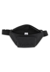 Μαύρο τσαντάκι μέσης από νάιλον με κεντρικό φερμουάρ, διακοσμημένο με ανάγλυφο  λογότυπο στο μπροστινό μέρος και ρυθμιζόμενο λουρί. Ομαλή υφή.