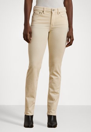 Beige rette benbukser laget av denim med en jevn tekstur. Har en frontknapplukking, fem lommer og diskrete stikninger.