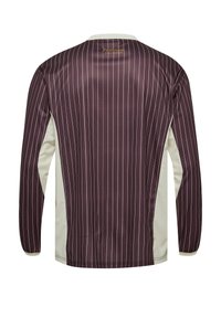 Langarm-Trikot in Dunkellila mit weißen vertikalen Streifen, ausgestattet mit einem hellbeigen Seitenpaneel und einem gerippten Kragen. Goldenes Logo auf der Rückseite.