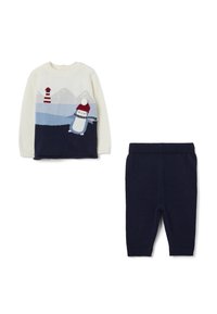 Breiset met een crèmekleurige trui met een pinguïnontwerp, marineblauwe accenten en bijpassende marineblauwe broek met elastische tailleband.