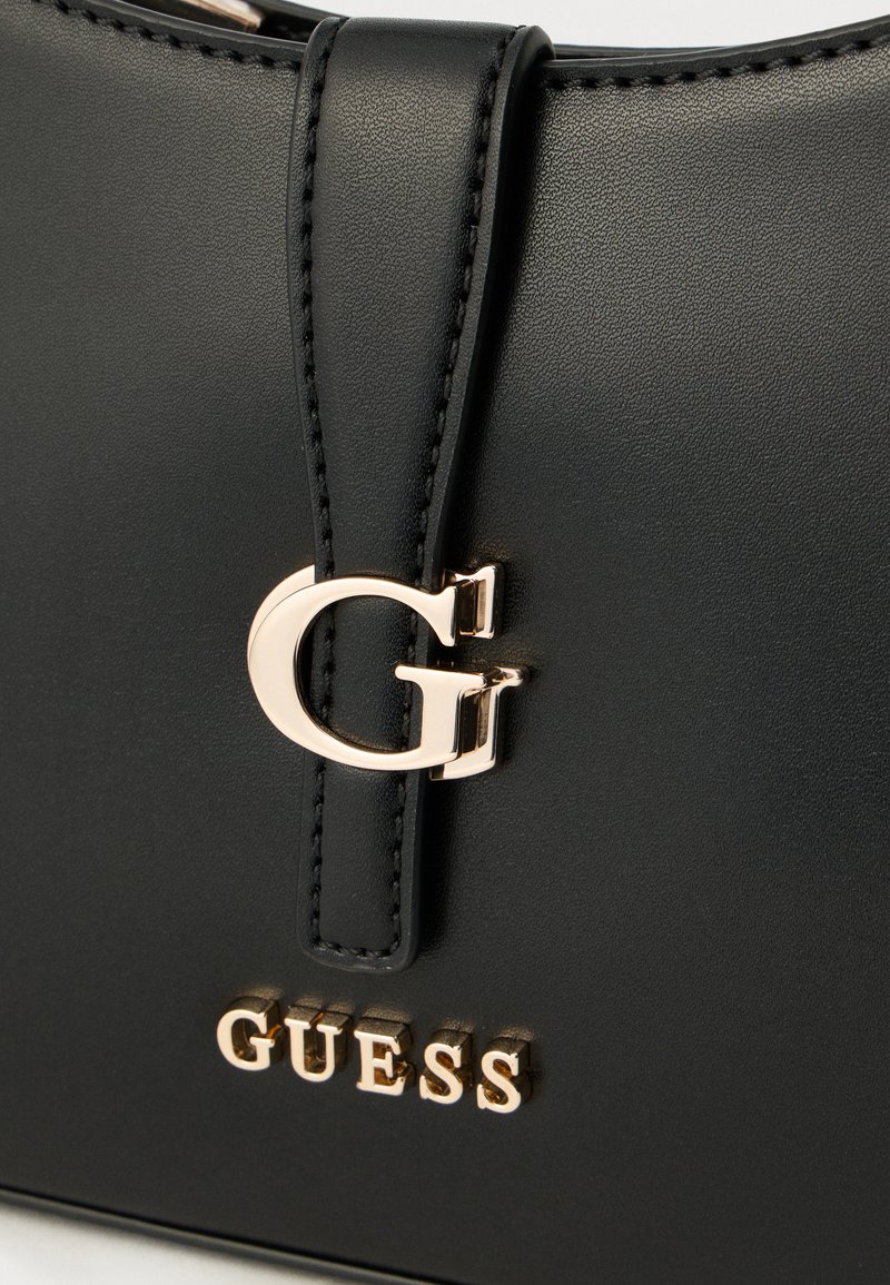 Bolsa de Mano Guess Caracara con Monedero
