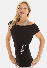 Black off-shoulder top with gray straps, fitted design, textured fabric, and white "Urshape" logo on the side.