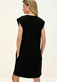 Next REGULAR FIT - Haljina od žerseja - black
