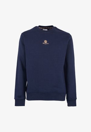 Felpa blu navy realizzata in tessuto morbido, dotata di collo a giro e polsini a costine, con un logo dorato sul petto e foderatura a scacchi.