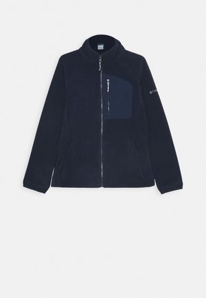 Giacca in pile navy con zip completamente apribile, colletto alto e tasca sul petto. Caratterizzata da una texture liscia e tasche laterali per una maggiore funzionalità.