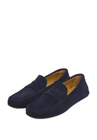 Loaferky z hladkého námořnického surového semiše s prošitým límcem, hladkým svrškem, designem na skluz a měkkou béžovou podšívkou. Flexibilní podešev pro pohodlí.