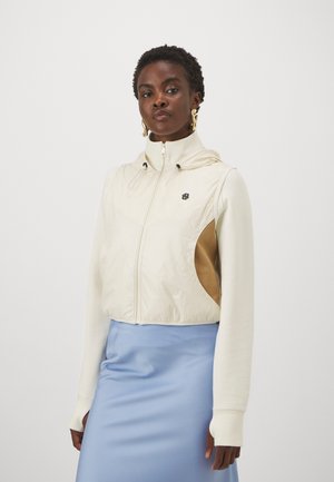 ETRACKER - Vetoketjullinen college - open white