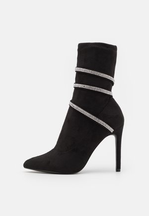 Bottines à talons hauts - black