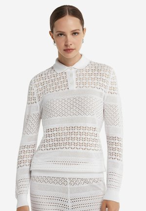 Stickad tröja - White