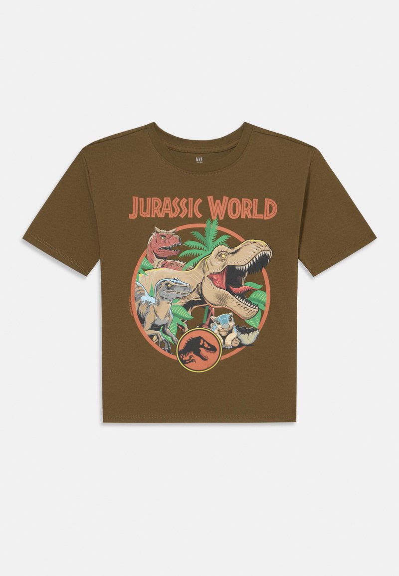 Ruda medvilnės marškinėliai su "Jurassic World" grafika, vaizduojančia dinozaurus ir palmų lapus ryškiomis spalvomis apskritoje kompozicijoje. Trumpomis rankovėmis.