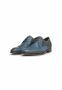 Scarpe in pelle blu con una finitura liscia e dettagli grigi testurizzati. Presentano una punta affilata, una chiusura con lacci e una suola in legno.