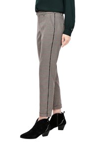 Raka rutiga byxor i beige, svart och röd med sidosträng. Tillverkade av vävd tyg, med en slät textur och ankellång passform.