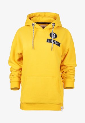 Yellow hoodie made of soft fabric, featuring a front pocket, ribbed cuffs, drawstring, and a black logo patch on the chest.