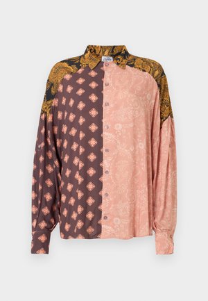 Long-sleeve button-up shirt featuring contrasting panels in pink and dark brown with intricate patterns; soft fabric with a collar and relaxed fit.
