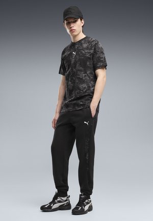 Puma, PUMA SPORT CAMO FLEECE SWEATHOSE - Pantalon de survêtement - black