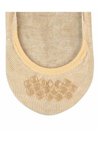 Beige Sock mit glatter Textur, ausgestattet mit einem verstärkten elastischen Bund und einem gummierten Rautenmuster auf der Unterseite für besseren Halt.
