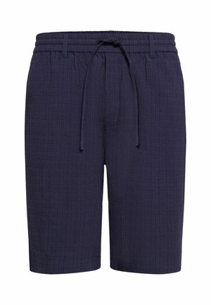 Pantalones cortos azul marino hechos de un tejido texturizado, que cuentan con una cinturilla elástica, cierre con cordón y un diseño de ajuste relajado.