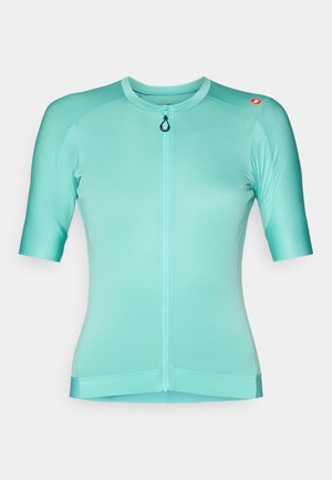 Short-sleeve cycling jersey in light teal with a front zipper, textured fabric, and logo accent on the shoulder.
