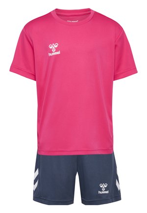 Pink short-sleeve sports shirt with white logo, paired with navy shorts featuring white chevron accents and logo on the side.