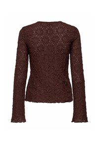 Blusa in pizzo marrone scuro a maniche lunghe con motivo floreale, silhouette aderente e bordi ondulati sulle maniche e l'orlo.