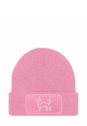 Pink knit beanie with a folded cuff, featuring a rectangular patch with a white outline of a dog. Textured fabric with ribbed pattern.