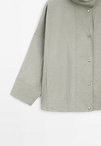 Light grey button-up jacket with oversized sleeves and side pockets, displayed against a white background.