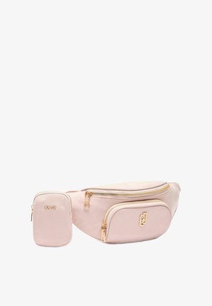 Sac banane en simili cuir rose avec quincaillerie dorée, comprenant un grand compartiment zippé et un petit pouch détachable, tous deux de texture lisse.