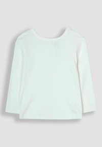 Top bianco a maniche lunghe realizzato in morbido tessuto a maglia. Presenta un collo rotondo e un delicato motivo a trama su tutta la superficie. Taglia 66.
