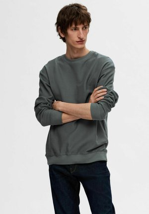 Sudadera - stormy weather