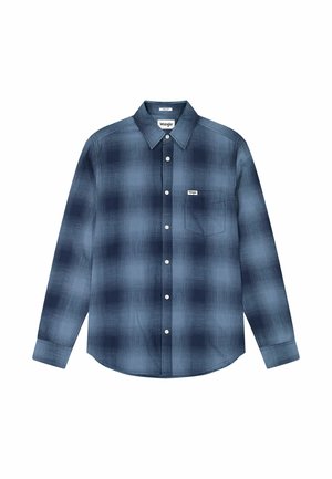 Long-sleeve button-up shirt in dark blue and black checkered pattern with a single chest pocket and Wrangler logo. Cotton blend material.