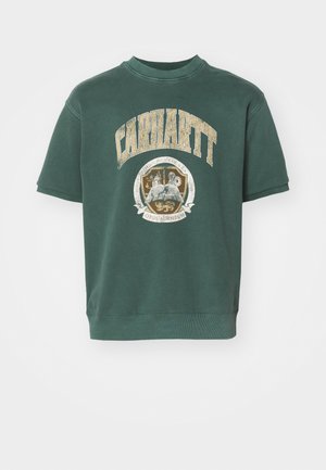 Green cotton blend short-sleeve sweatshirt featuring a large Carhartt logo and a circular graphic emblem on the front. Soft, textured fabric.