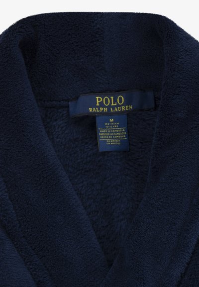 Námornícky modrý plyšový župan so šálovým golierom, s označením "Polo Ralph Lauren" a jemným, štruktúrovaným povrchom. Veľkosť M.
